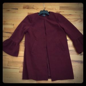 Long burgundy jacket with flared sleeves